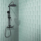 Blizzard blue glass subway tile 3x12 matte finish on shower wall