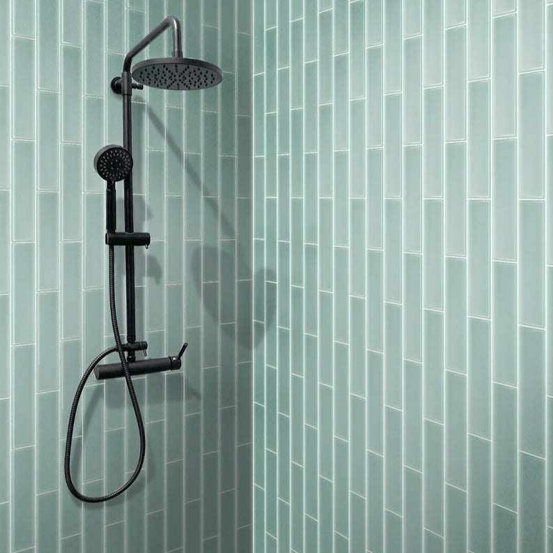 Blizzard blue glass subway tile 3x12 matte finish on shower wall
