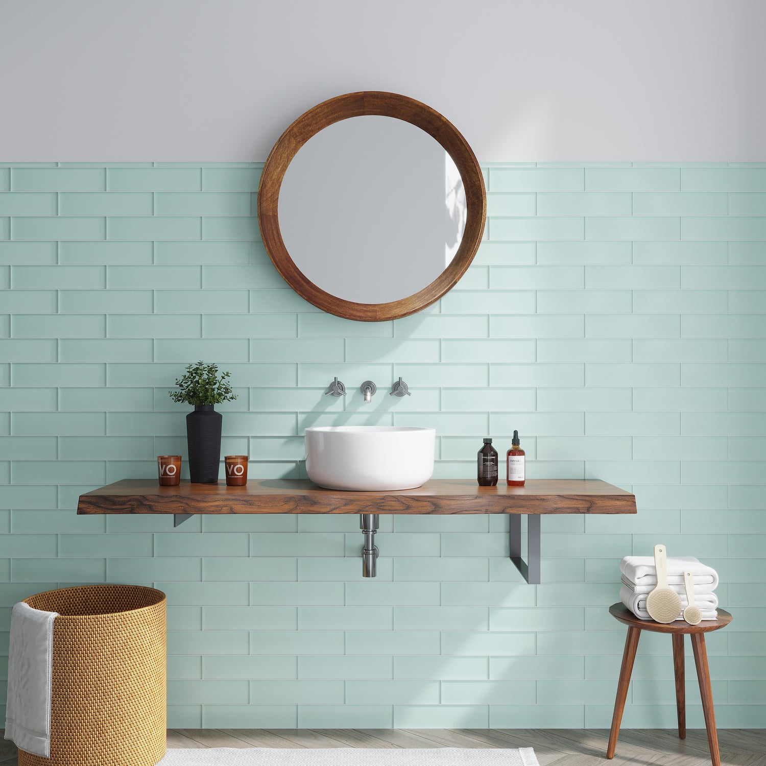 Blizzard blue matte glass subway tile 3x12 inch installed on bathroom wall