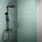 Blizzard blue matte glass subway tile 3x12 inch installed on shower wall