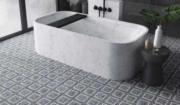 Modern bathroom shower with white marble large tile and clean grout lines on floor