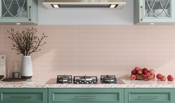 Kitchen backsplash with soft pink rectangular ceramic tiles