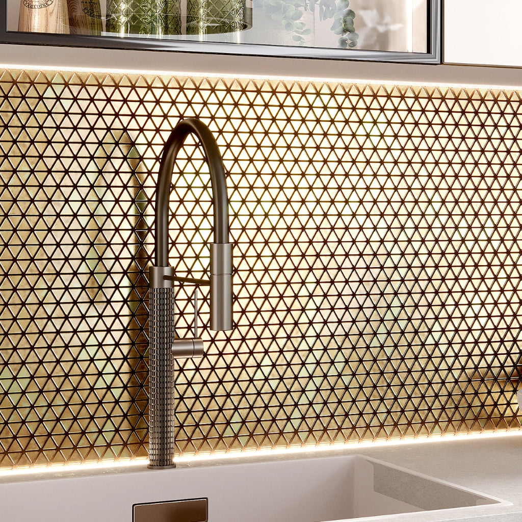 Glossy shimmer gold triangle glass mosaic tile backsplash with uniform geometric pattern