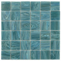 Glossy Yale Blue 2x2 square glass mosaic tiles with swirling aquatic patterns and subtle color variations