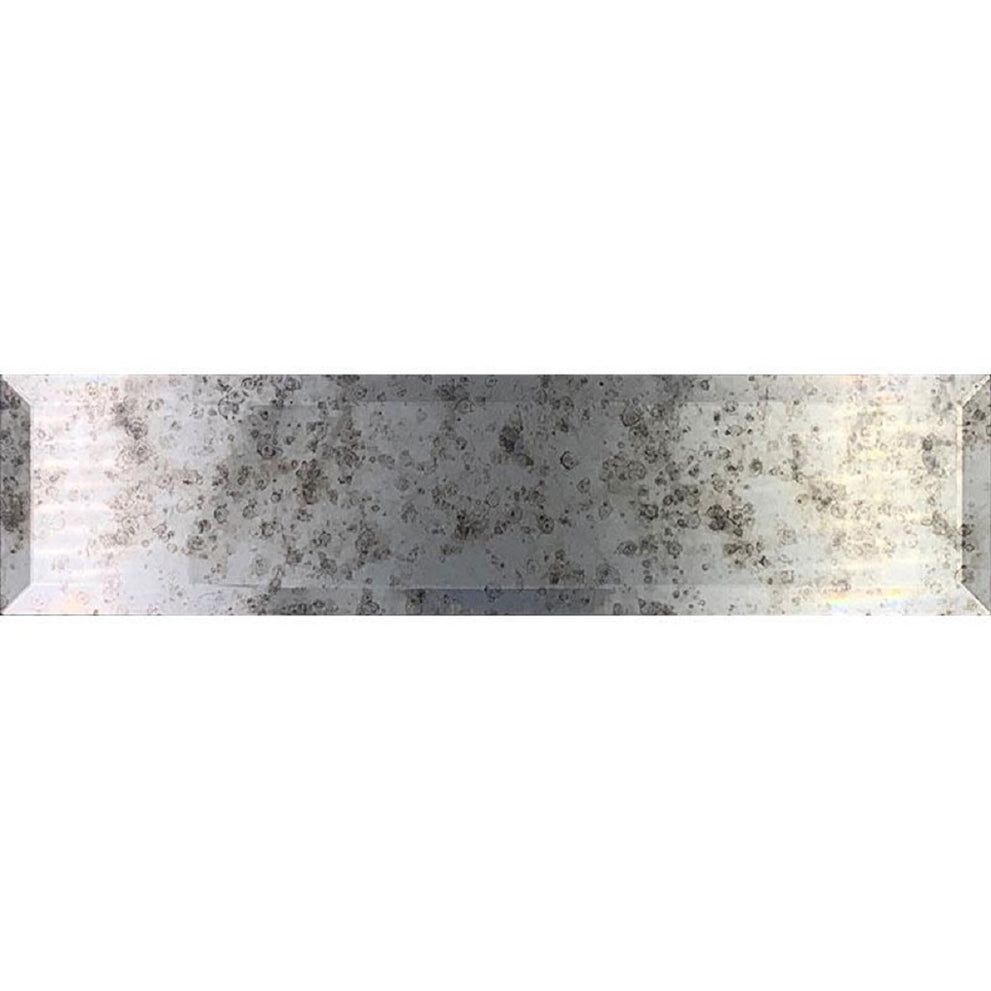 Glister silver polished and beveled mirror glass subway tile in a staggered pattern