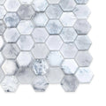 matte white hexagon glass mosaic tiles with subtle gray and silver marbling on mesh backing