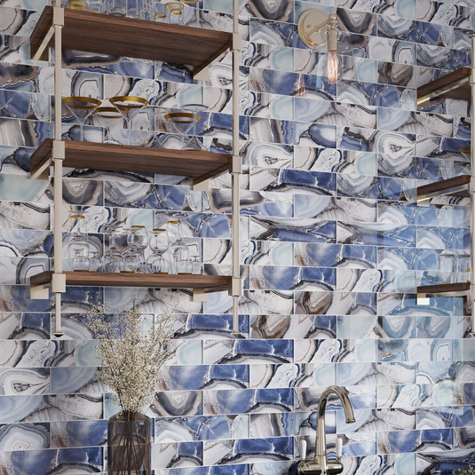 sea blue 3x12 glossy glass subway tile with wave-like patterns and glossy finish