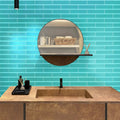 Sky blue matte glass subway tile 3x12 installed on bathroom wall