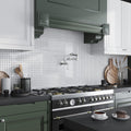 White glossy square glass mosaic tile backsplash in kitchen wall setting