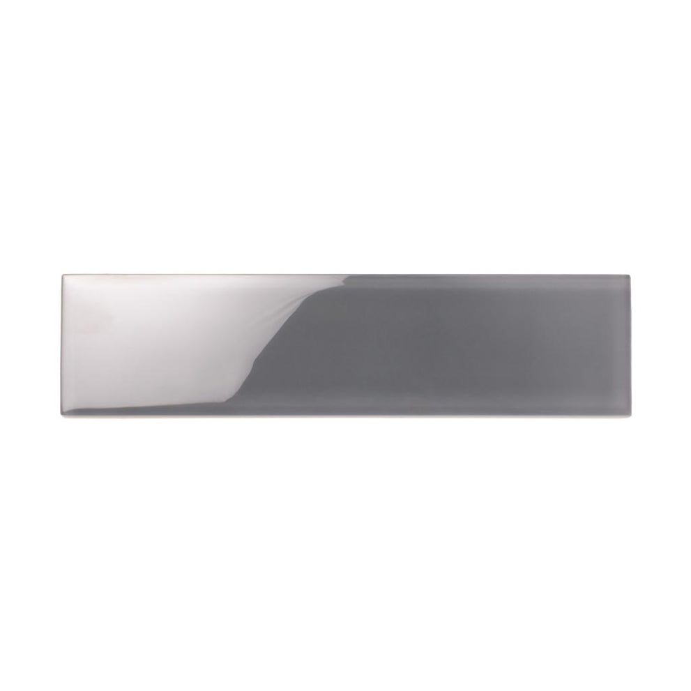 Glass subway backsplash tile in a coin gray tone and glossy finish