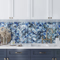 Glossy blue glass subway tile, 3x12 inches, installed as a kitchen backsplash