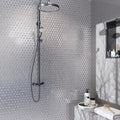 Silver glossy hexagon glass mosaic tile, 12x12, installed on shower wall