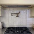 White 12x12 glossy and matte herringbone glass mosaic tile backsplash in kitchen wall