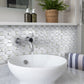 Pearl White polished Thassos shell octagon mosaic tile backsplash in bathroom setting