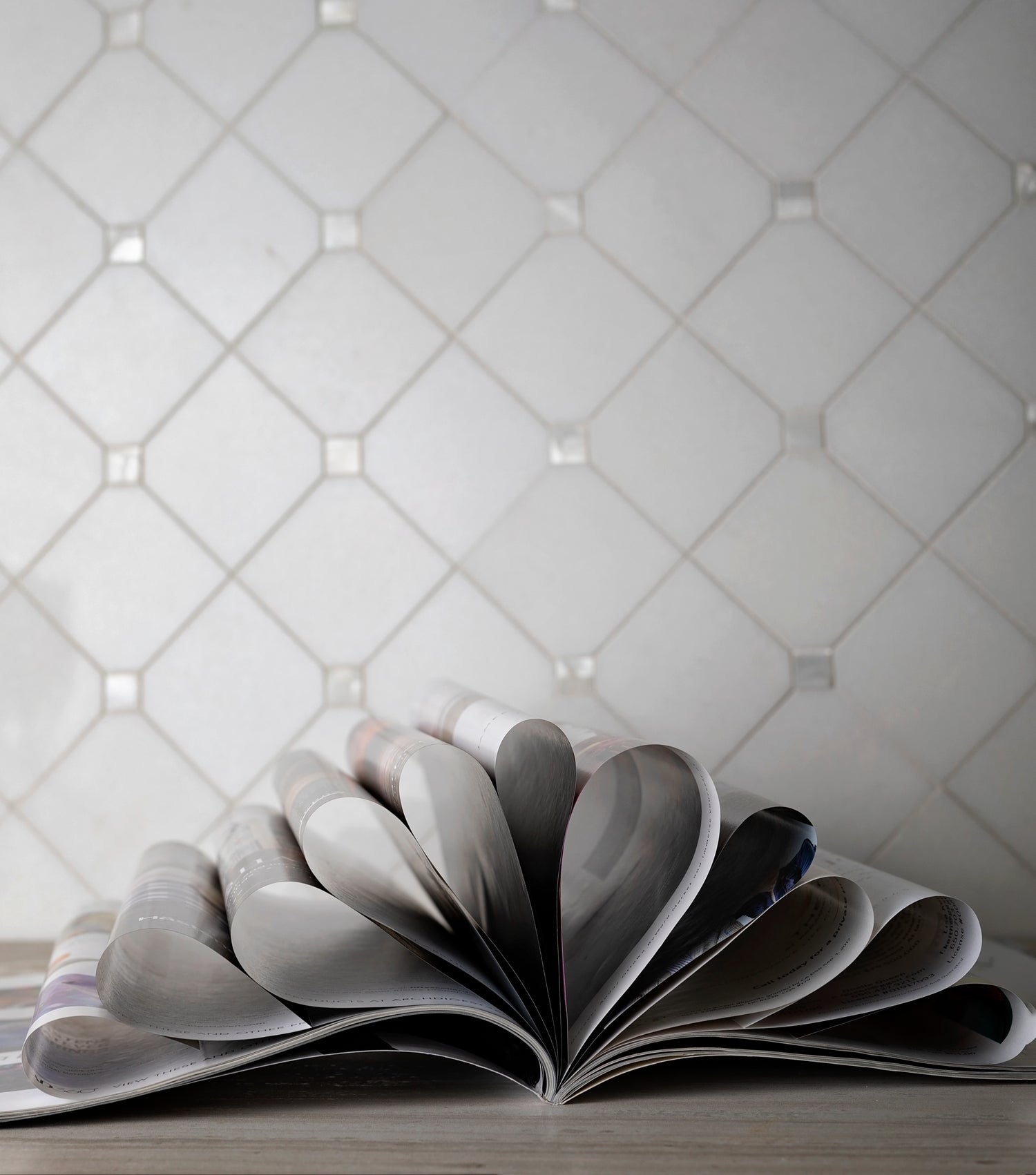 Pearl white polished Thassos shell hexagon mosaic tile with subtle shine and textured grout lines