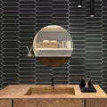 Black 2x10 matte ceramic picket tiles on interior wall backsplash
