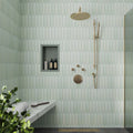 Tea green ceramic matte picket tiles 2x10 inches installed on bathroom shower walls