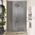 Metallic silver glossy ceramic picket tiles on shower wall with elongated hexagonal shape