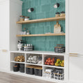 Pine green matte ceramic picket tile 2x10 inches installed on kitchen backsplash