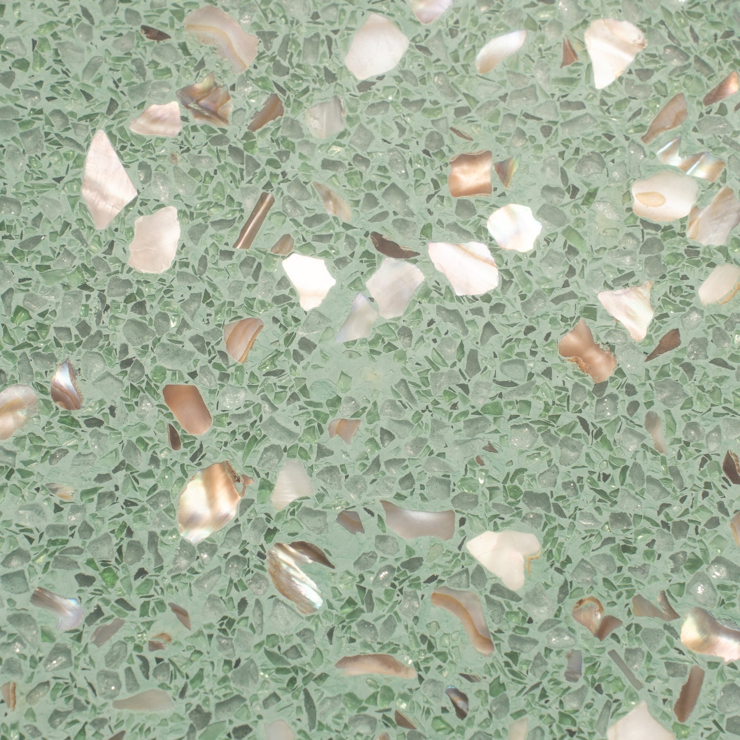 Glossy mint green terrazzo hexagon tile with shell and copper flecks, 9x8 inches