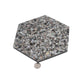 Glossy black terrazzo hexagon tile with amber pearl flecks, 9x8 inch shell pattern