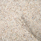 Glossy ivory white terrazzo hexagon tile with copper flecks and shell pieces, 9x8 inches