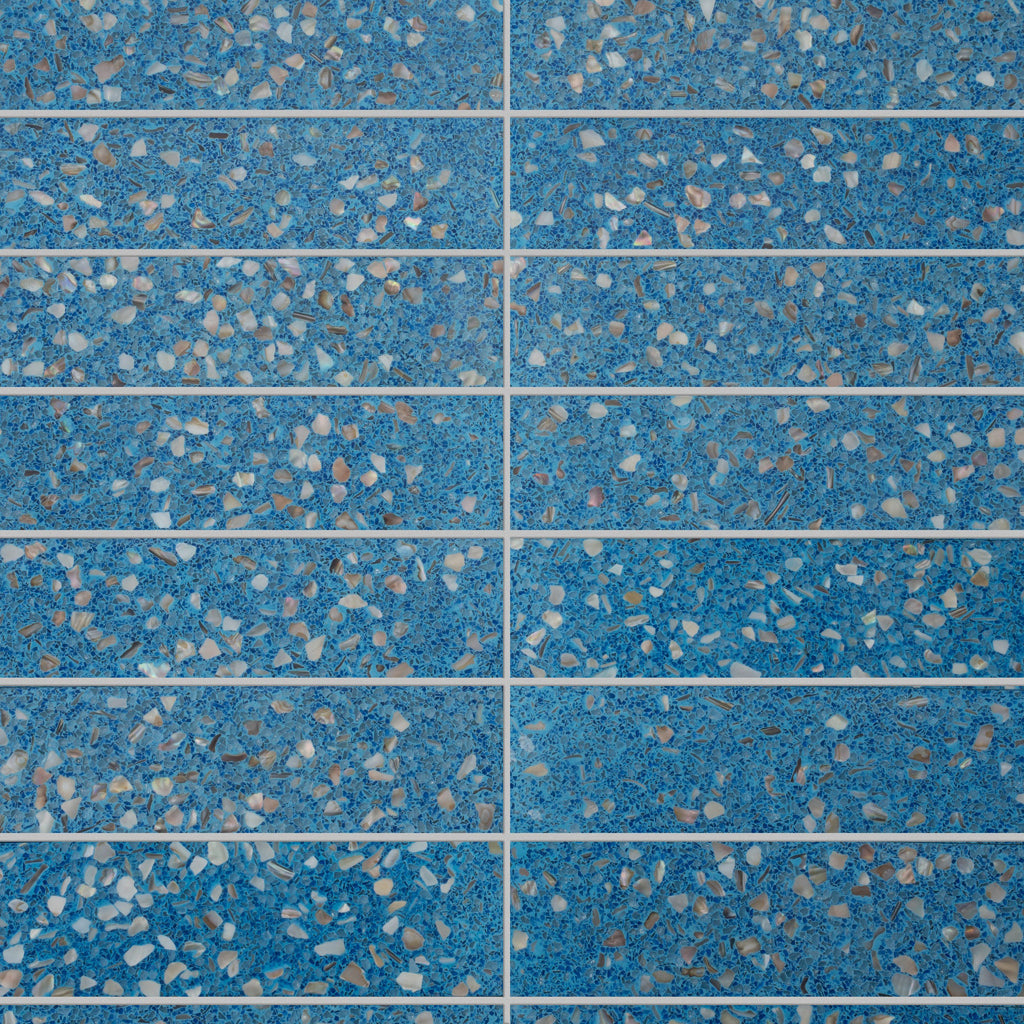 Glossy Yosemite blue terrazzo elongated subway tile with shell and copper flecks 3x12 size