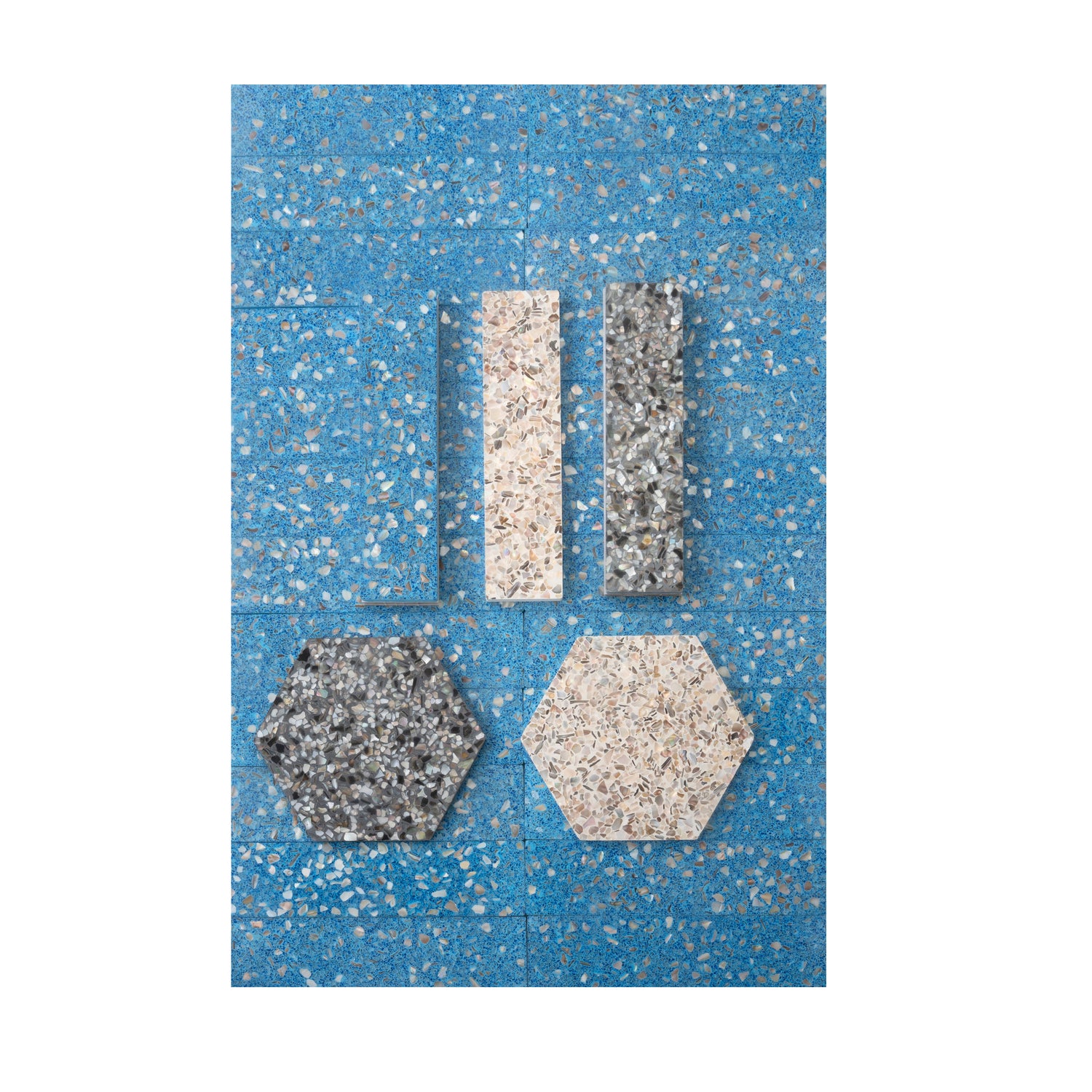 Glossy Yosemite Blue terrazzo subway tiles with copper flecks 3x12 elongated shell shape