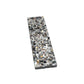Glossy black terrazzo elongated subway tile with amber and pearl flecks 3x12 inches