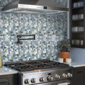 Light blue 12x12 glossy square glass mosaic tile backsplash in a kitchen setting