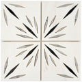 White 12x12 honed dolomite tiles with ice grey and black starburst mosaic pattern