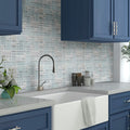 Pearl white glass and stone mosaic tile with polished, matte, and textured finish on kitchen backsplash