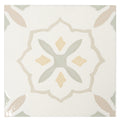 Off-white 9x9 square porcelain tile with subtle yellow and beige floral geometric pattern