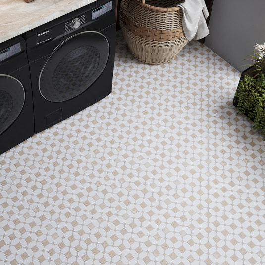 white and beige octagon and dot polished marble mosaic tile flooring in laundry room