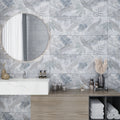 White gray 16x48 ceramic tile with matte finish and leaf pattern on bathroom wall