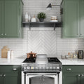 Glossy ivory white ceramic pencil tile trim 0.5x8 inches on kitchen backsplash