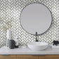 white and gray polished marble herringbone mosaic tile with black grout