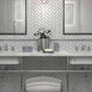 white gray polished marble tiles arranged in 10x11 herringbone mosaic pattern