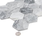 Hexagon honed Calacatta Bluette mosaic tiles in light gray with polished finish