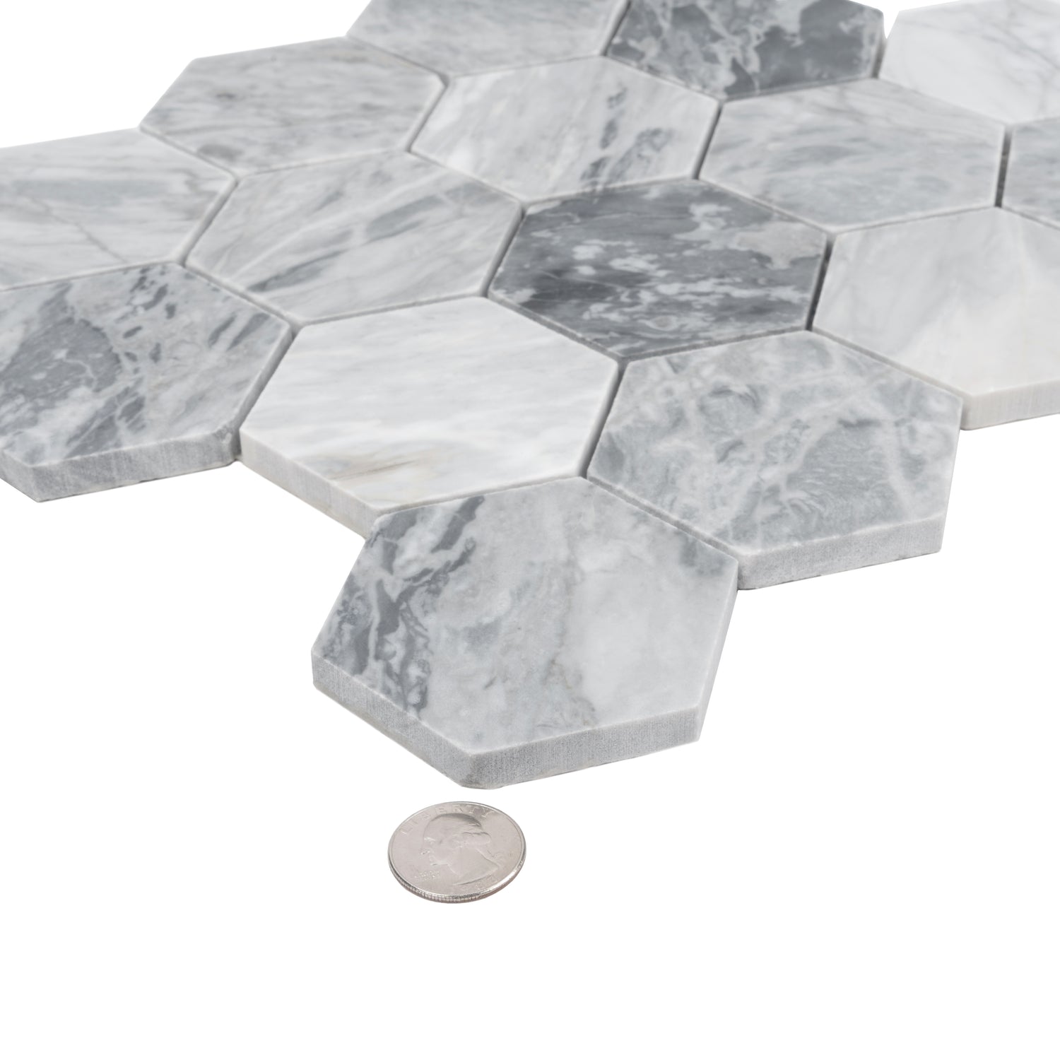 Hexagon honed Calacatta Bluette mosaic tiles in light gray with polished finish