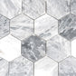 Light gray honed Calacatta Bluettemosaic hexagon tile with natural marble veining