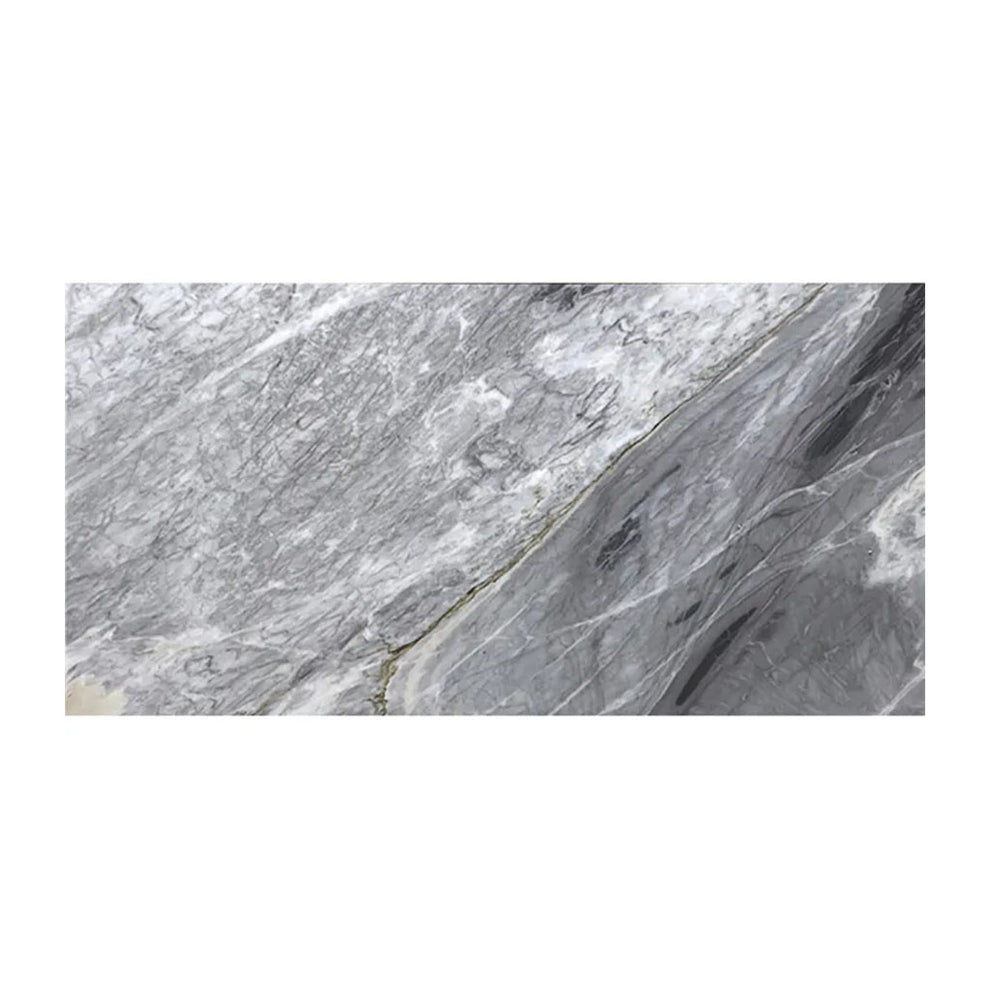 Gray honed Calacatta Bluette marble large format tile in a vertical staggered tile layout