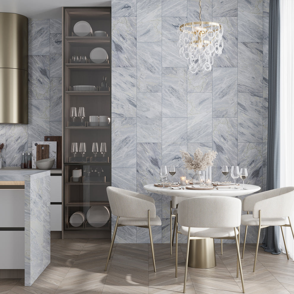 Gray honed Calacatta Bluette marble large format tile in a vertical staggered tile layout
