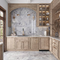 Polished gray Calacatta Bluette marble 12x24 tile on kitchen backsplash and floor