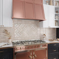 Beige Crema Marfil polished beveled 3x6 marble subway tile backsplash as kitchen wall