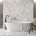 White gray Calacatta Gold marble 12x24 polished tiles on bathroom wall and floor