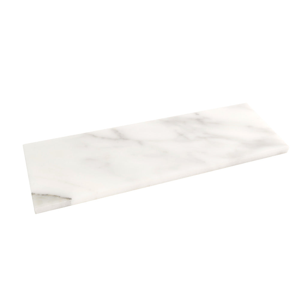Polished white marble shower tile