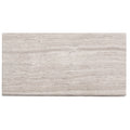 Cloud gray honed marble subway tile with subtle horizontal veining and matte finish