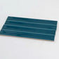 Horizonte 1.97 in. x 15.75 in. Glossy Emerald Petrol Blue Ceramic Deco Subway Wall Tile (10.76 sq ft/case) - 50 Pack