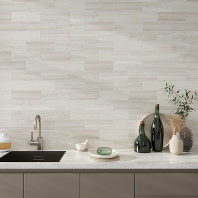 Wooden beige honed marble subway tile 4x12 installed on kitchen backsplash